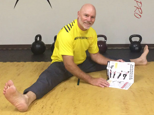 Jay Armstrong Sitting Stretching