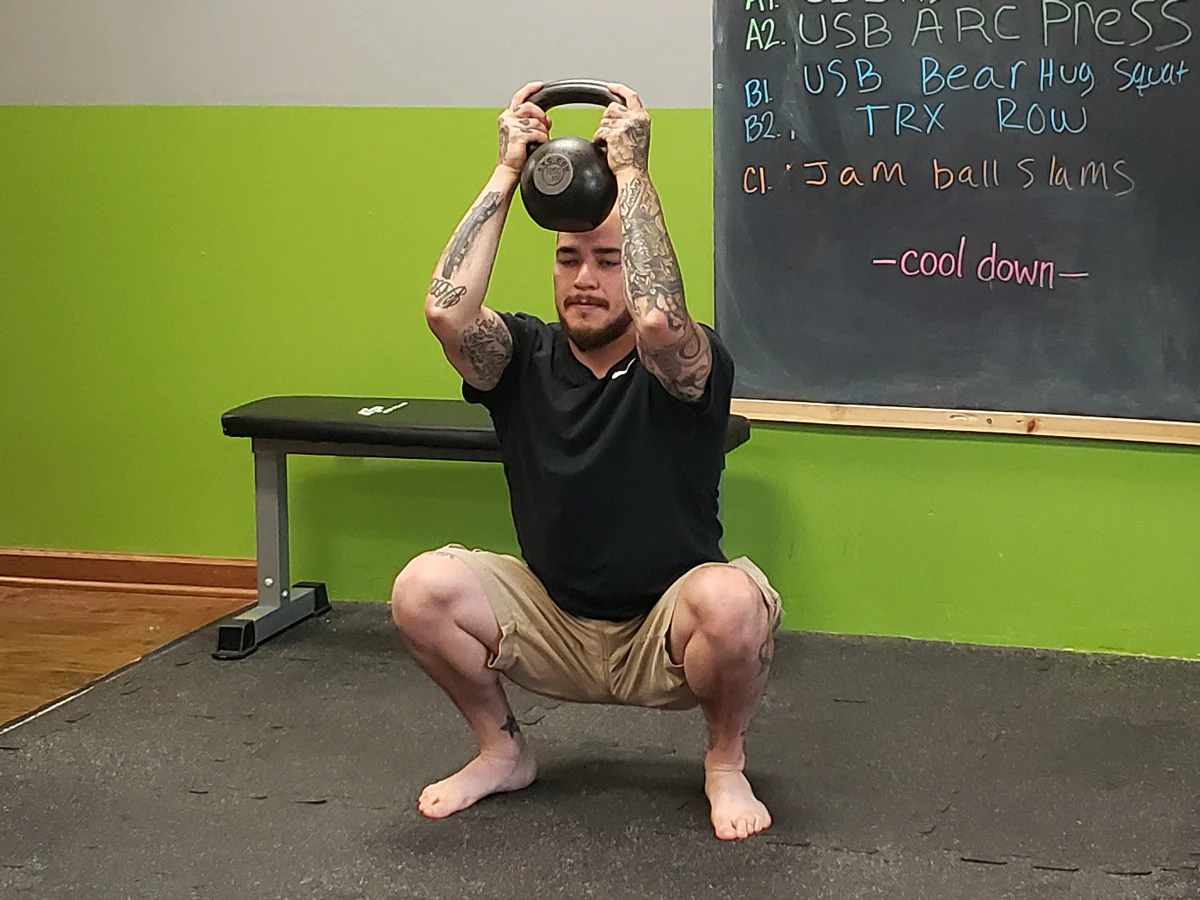 William Sturgeon performs a kettlebell "Simba" squat