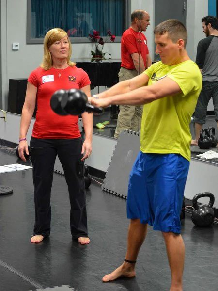 Lori Crock coaching Neal DenHartog